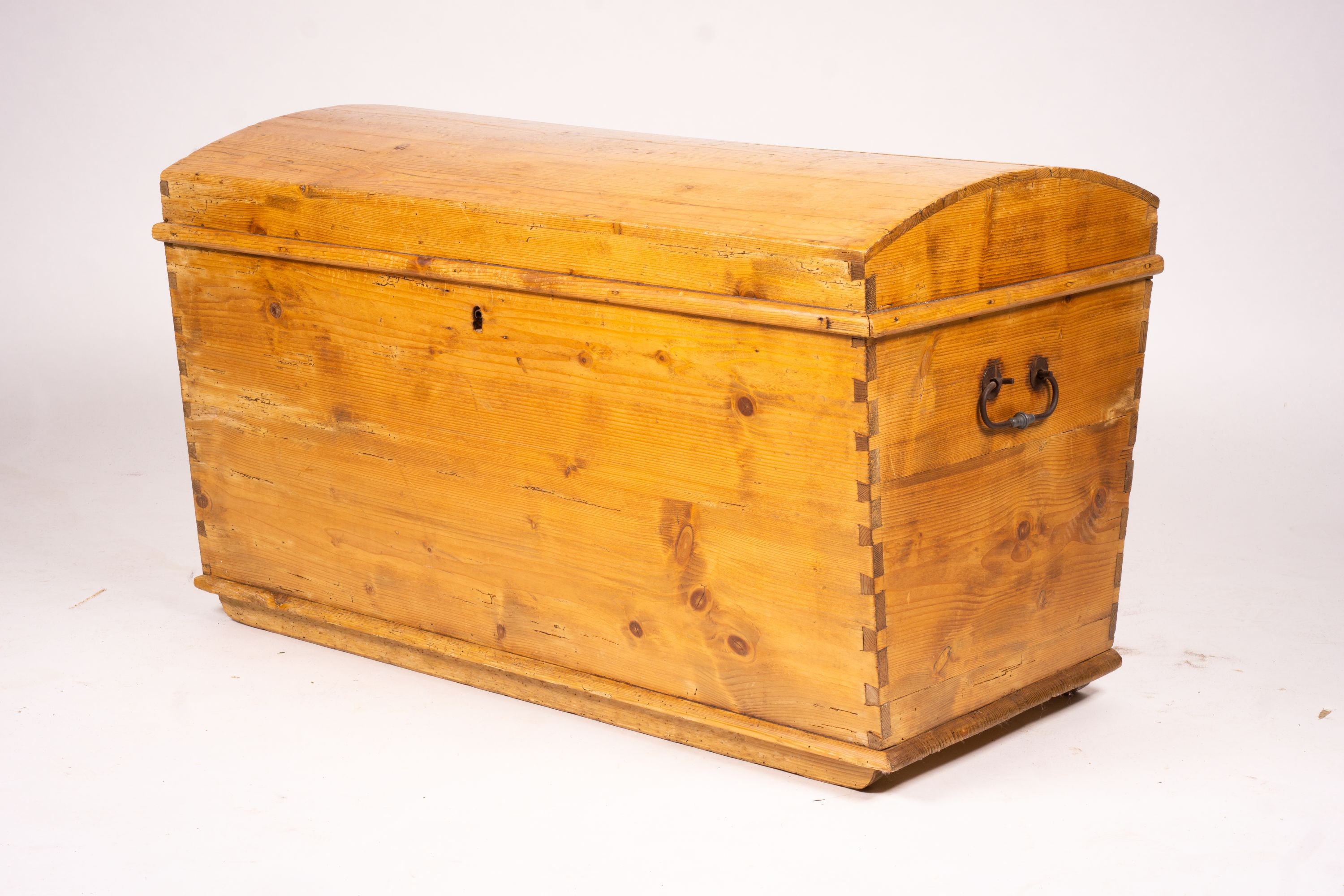 A 19th century Continental pine dome top trunk, length 98cm, width 54cm, height 58cm